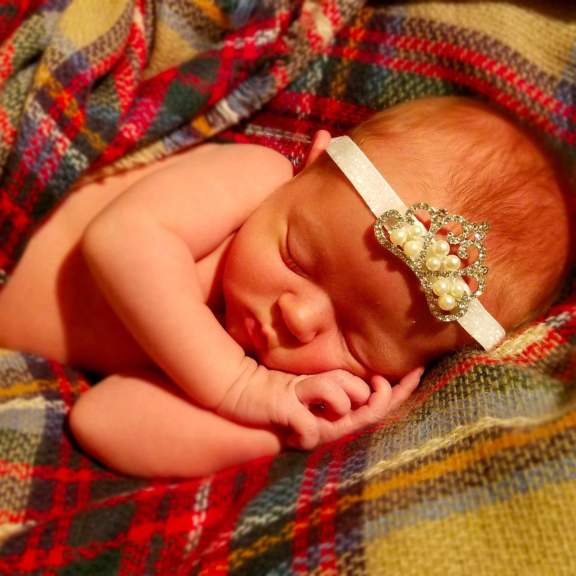 Harper Rae is registered to the contest to win money with this photo: baby, child, design, fashion_accessory, finger, flesh, gesture, hand, jewellery, leg, nail, pattern, plaid, smile, tartan, textile, thumb, toddler