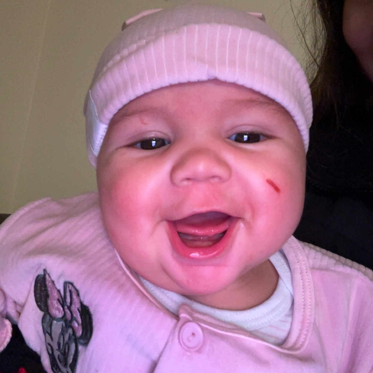 Dayana joined the competition — help win amazing prizes! apparel, baby, baby_girl, cheek, child, closeup, cute, face, happy, hat, headwear, human, indoor, infant, person, pink_clothing, portrait, skin, smiling, tooth