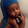 Karl joined the competition — help win amazing prizes! baby, sleeping, blue_hat, infant, soft_lighting, close_up, peaceful, toy_football, skin, child, cute, portrait, newborn, cozy, hands, face, headwear, resting, toddler, warm_colors