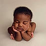Karl is registered to the contest to win money with this photo: baby, infant, sleeping, peaceful, hands, feet, skin, face, closed_eyes, cute, newborn, portrait, posing, studio, soft_light, calm, child, toddler, adorable, background