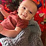 Cyrus joined the competition — help win amazing prizes! baby, blanket, child, christmas, clothing, cozy, cute, decor, face, holiday, indoors, infant, portrait, present, red, relaxing, smile, soft, texture, warm
