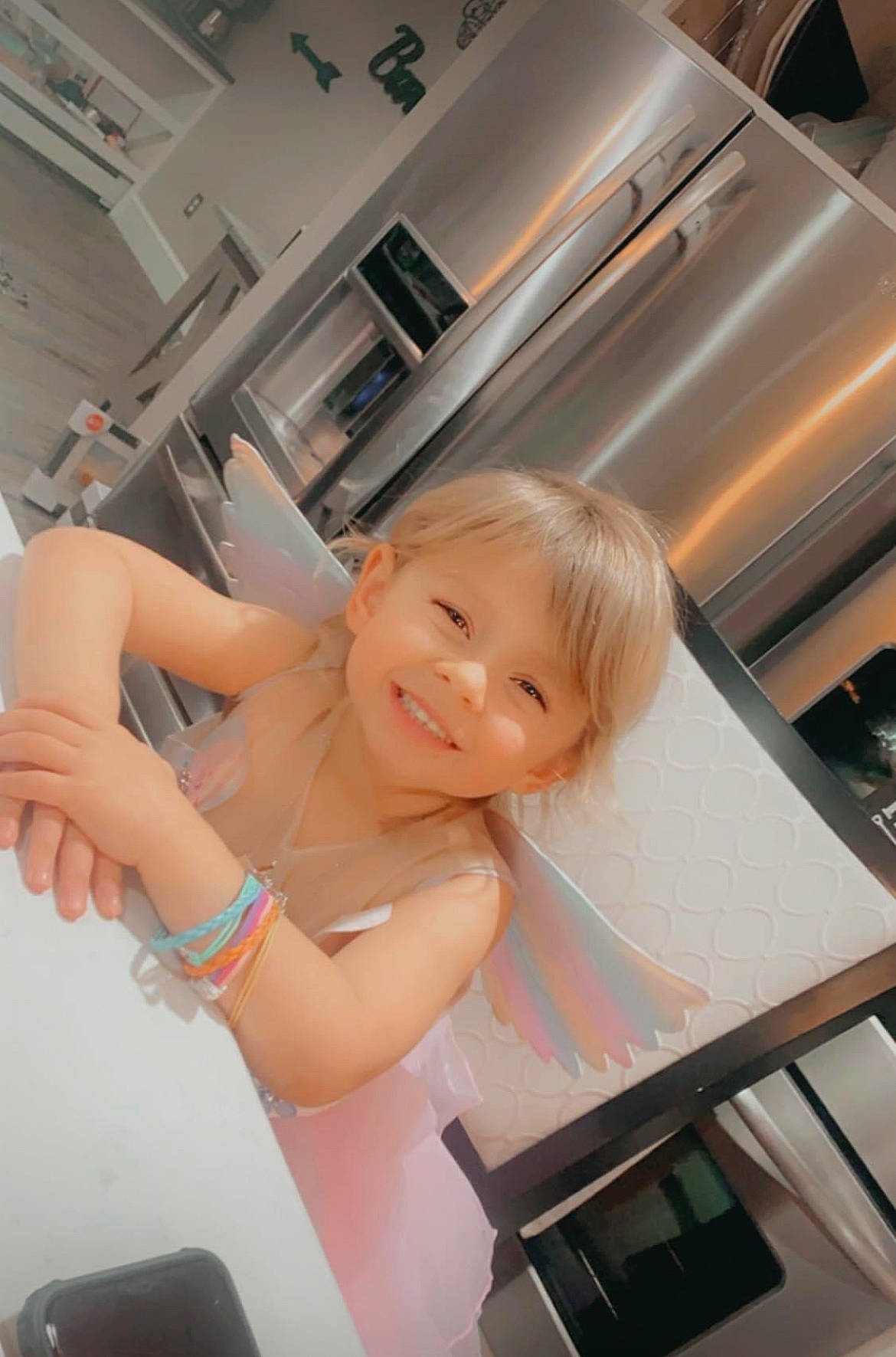 Sage is registered to the contest to win money with this photo: aluminium, chest, child, comfort, fun, happy, home_appliance, human_leg, joy, kitchen_appliance, machine, magenta, major_appliance, person, room, smile, thigh, thumb, toddler, window