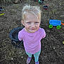 Oakley joined the competition — help win amazing prizes! child, girl, outdoor, dirt, dog, toys, bicycle, wagon, playground, grass, smile, blonde_hair, purple_shoes, leggings, pink_shirt, pet, nature, sunlight, happy, casual_clothing