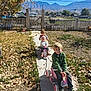 Noah Diekmann is registered to the contest to win money with this photo: backyard, boy, child, clothing, face, female, fence, footwear, girl, grass, head, male, nature, outdoors, person, photography, plant, portrait, shoe, yard