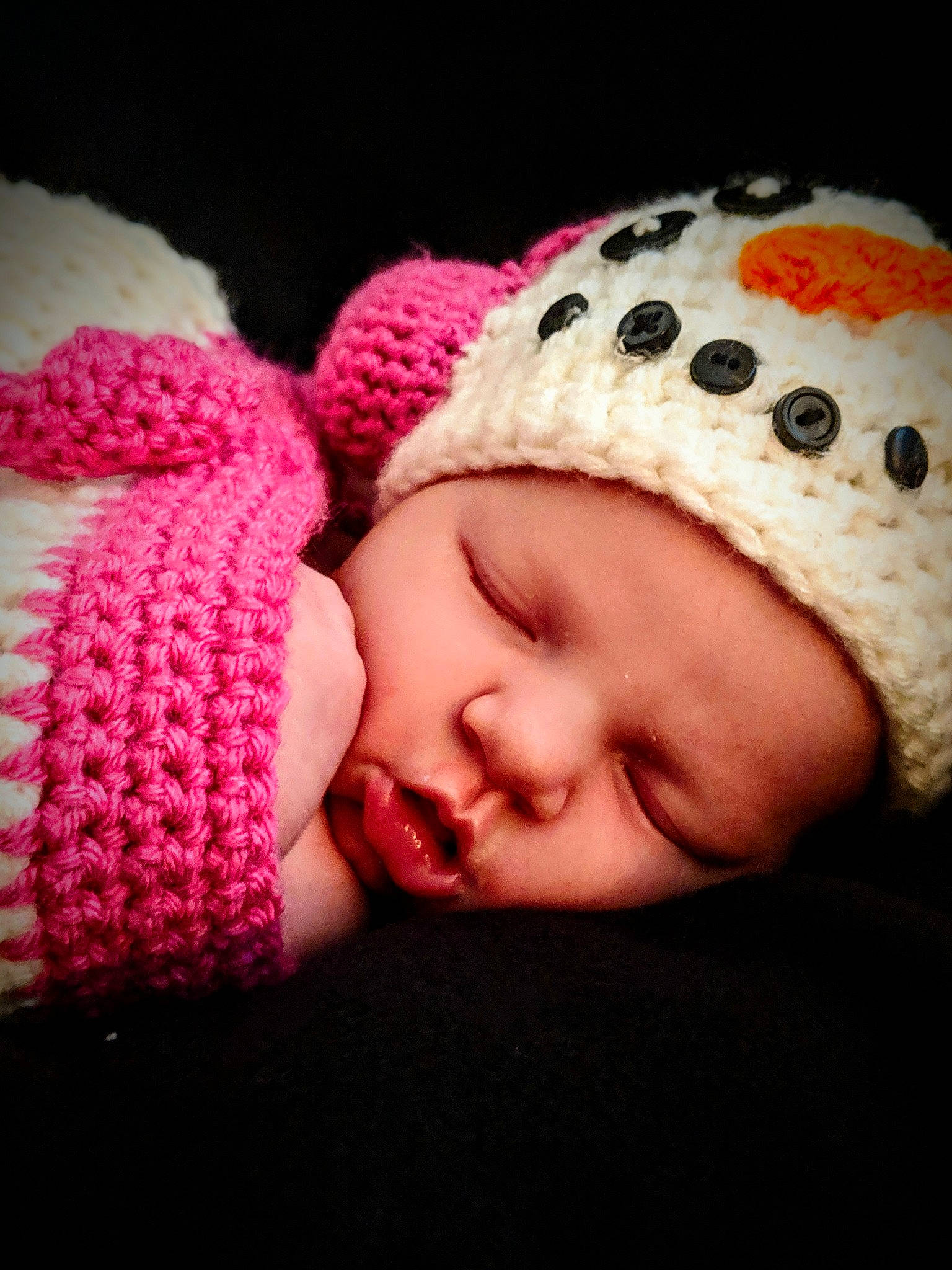 Emma Kae is registered to the contest to win money with this photo: beanie, cap, cheek, child, close_up, crochet, girl, headgear, headwear, infant, knit_cap, knitting, lip, person, skin, sleep, smile, textile, toddler
