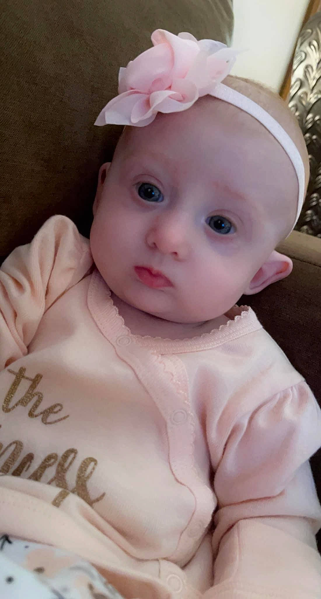 Brylee is registered to the contest to win money with this photo: baby, baby_products, baby_toddler_clothing, cap, cheek, dress, eye, eyebrow, eyelash, head, headband, headgear, headpiece, headwear, iris, lip, person, pink, skin, sleeve