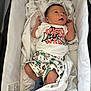 Jules a rejoint le concours — aidez-le/la à gagner de superbes lots ! baby, bassinet, blanket, blue_sock, child, clothing, cute, fabric, indoor, infant, looking_up, newborn, pattern, person, resting, shorts, sleeping_area, soft, spiderman, tshirt