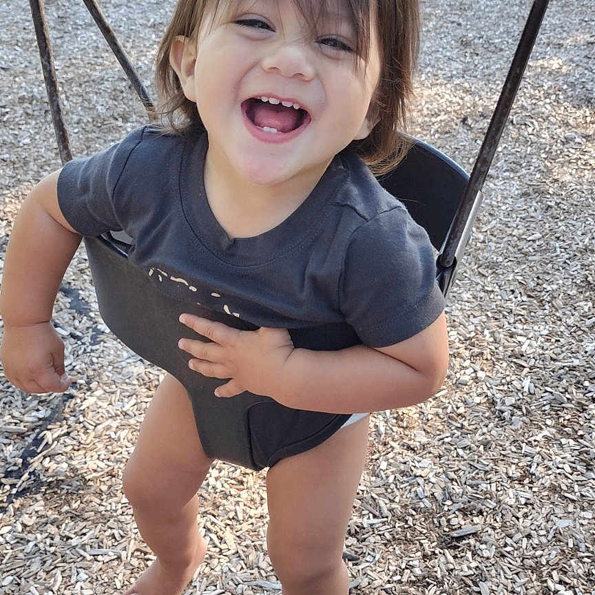 Atticus joined the competition — help win amazing prizes! baby, car, face, grass, happy, head, machine, nature, outdoorplayarea, outdoors, park, person, photography, plant, playarea, portrait, swing, toy, transportation, wheel