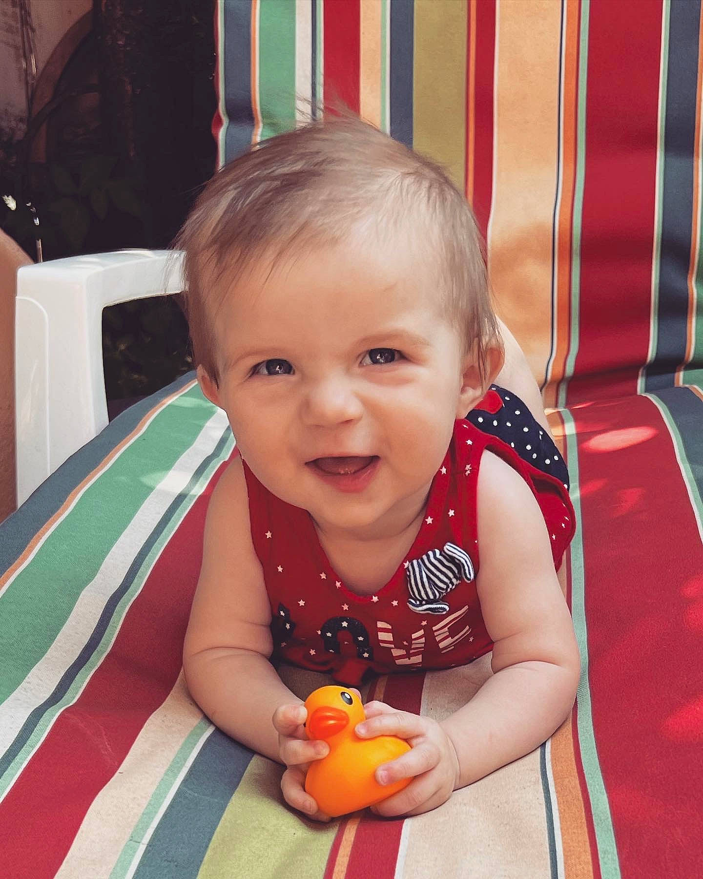 Klara is registered to the contest to win money with this photo: baby, baby_toddler_clothing, beauty, child, event, eye, facial_expression, fun, happy, head, human, iris, leisure, mouth, nose, person, recreation, red, skin, smile