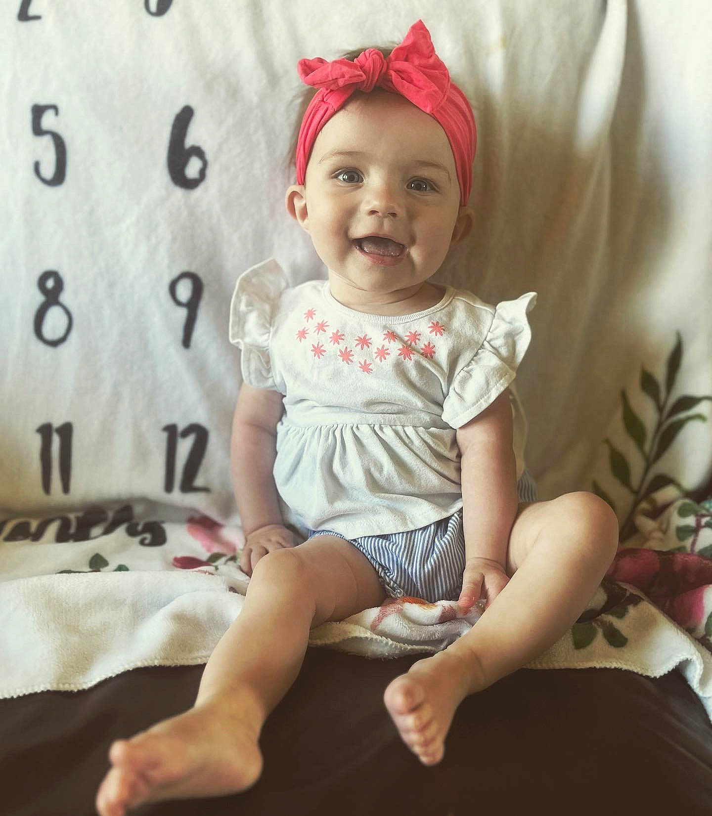 Klara joined the competition — help win amazing prizes! baby, baby_toddler_clothing, cap, child, comfort, costume_hat, fun, happy, human_leg, pattern, person, product, sitting, skin, sleeve, smile, standing, t_shirt, textile, thigh