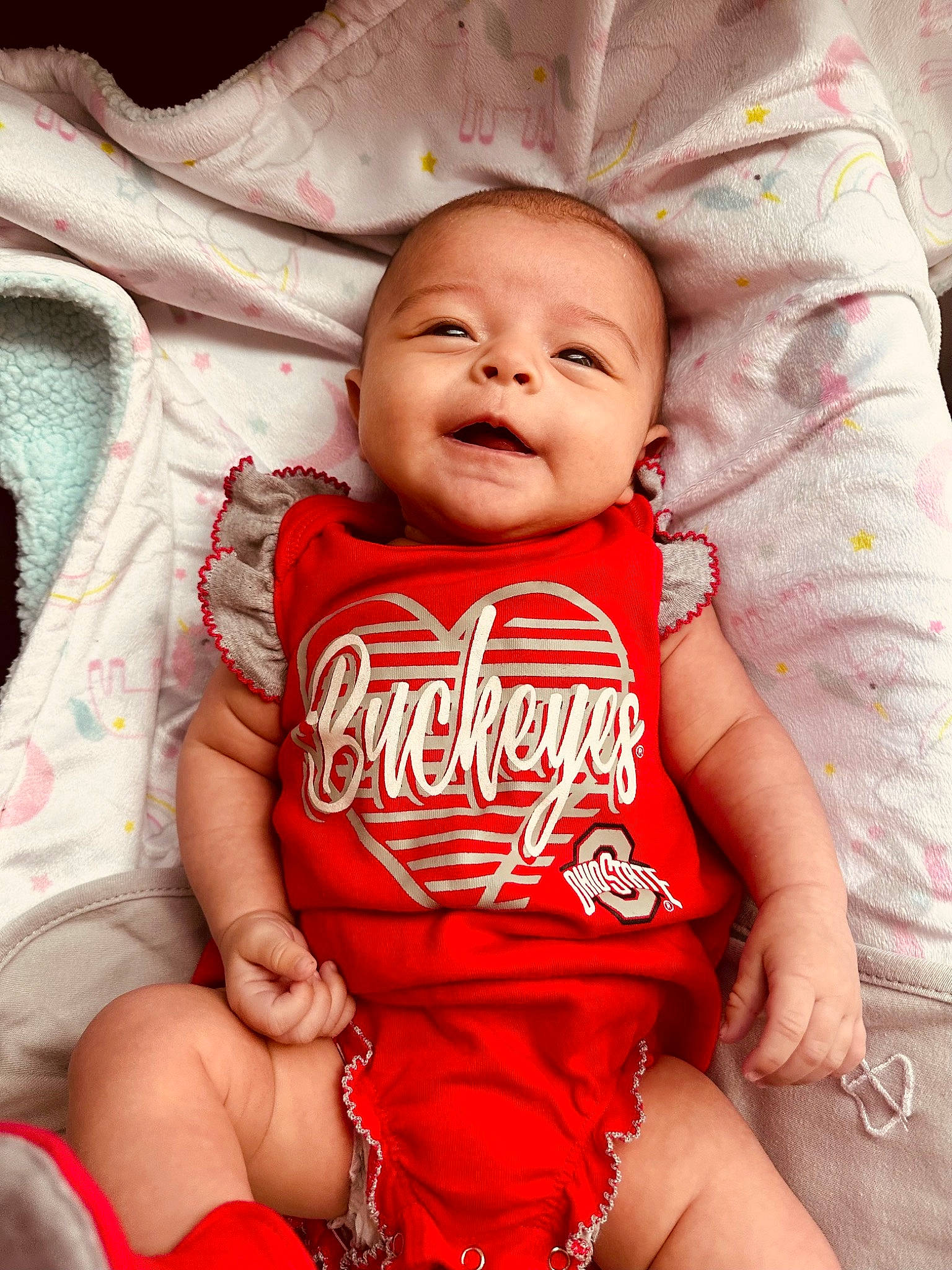 Gianna joined the competition — help win amazing prizes! baby, baby_toddler_clothing, cheek, child, comfort, facial_expression, happy, linens, magenta, mammal, person, pink, product, skin, sleeve, smile, t_shirt, textile, thigh, toddler