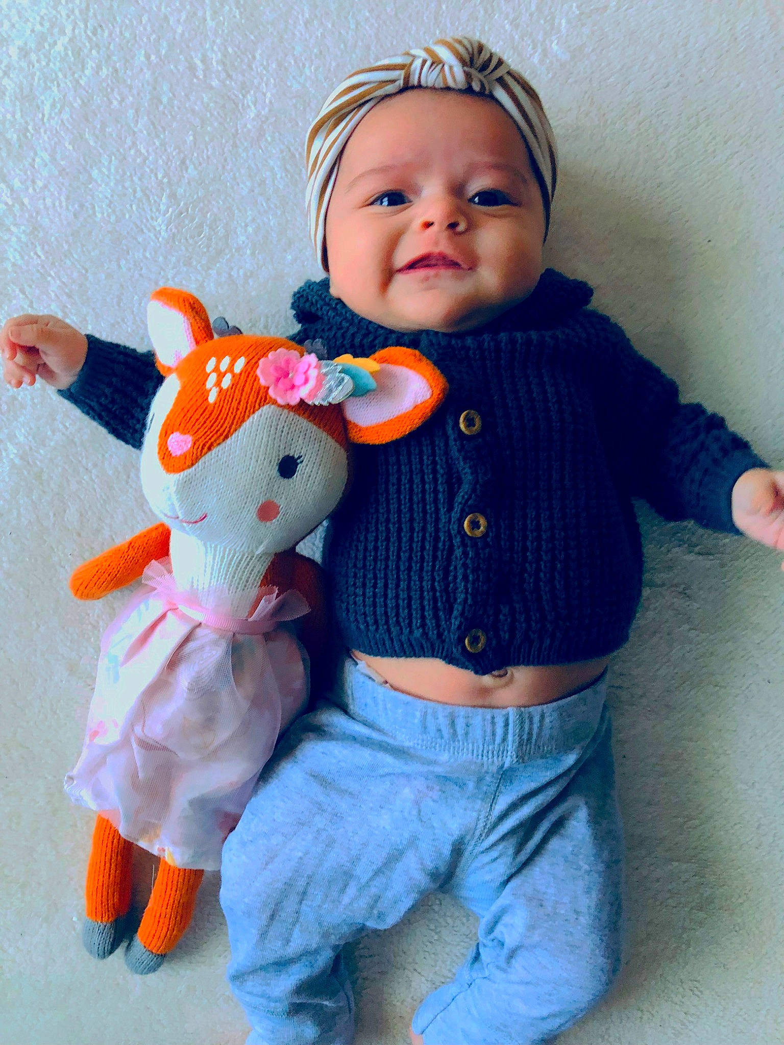 Gianna joined the competition — help win amazing prizes! baby, baby_toddler_clothing, child, doll, finger, hand, happy, joint, mammal, organ, pattern, person, pink, skin, sleeve, smile, stuffed_toy, textile, toddler, toy