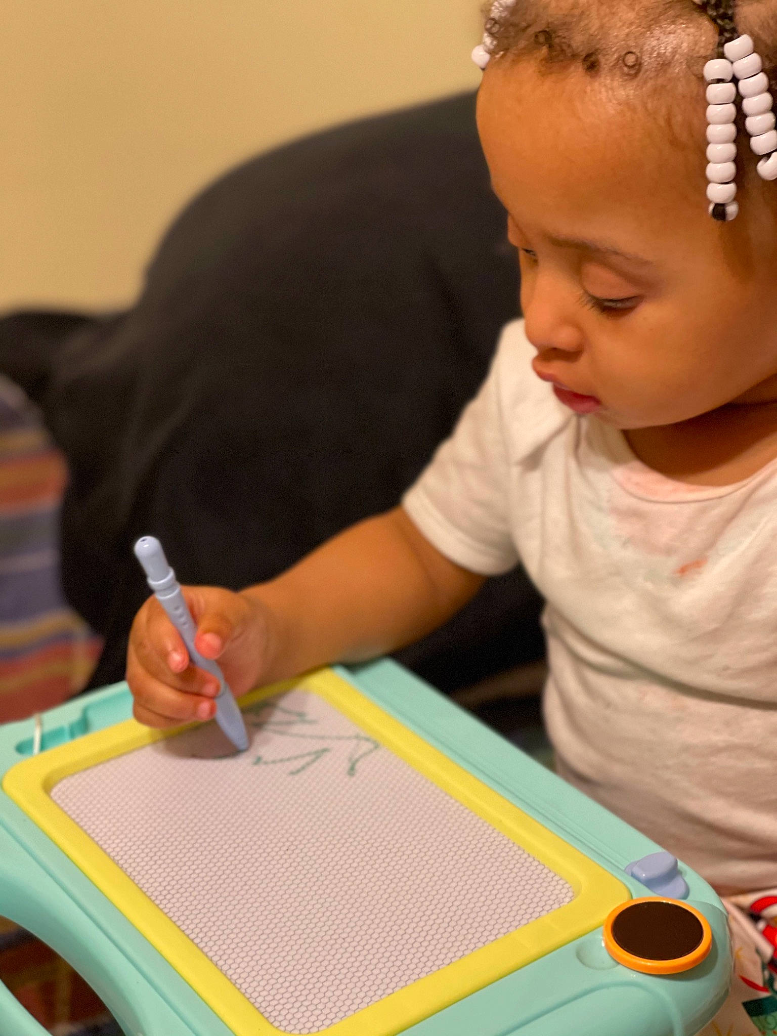 Storm Denise is registered to the contest to win money with this photo: braid, child, child_art, craft, creative_arts, hair_accessory, headband, headpiece, learning, linens, office_supplies, pattern, pen, person, play, stationery, t_shirt, textile, thread, writing