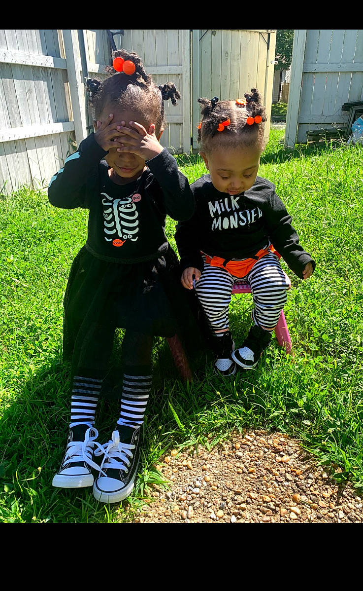 Skai Marie is registered to the contest to win money with this photo: active_pants, baby, baby_toddler_clothing, cap, child, cool, footwear, garden, goggles, grass, human, leg, person, shoe, sneakers, sock, sunglasses, sweatpant, toddler, walking_shoe