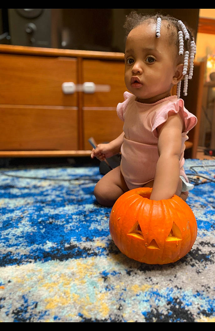Storm Denise is registered to the contest to win money with this photo: _and_melon_family, _gourd, baby, baby_toddler_clothing, baby_toys, cabinetry, calabaza, child, cucumber, cupboard, drawer, foot, gourd, orange, person, produce, pumpkin, sideboard, squash, toddler