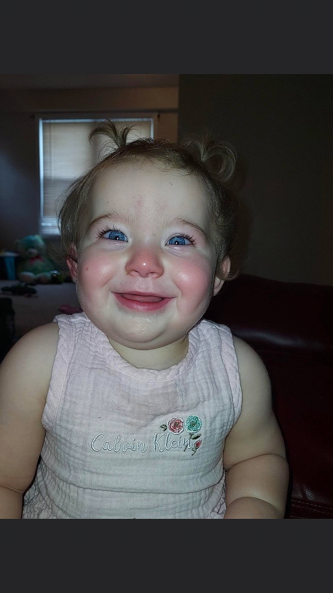 Veronica is registered to the contest to win money with this photo: baby_toddler_clothing, cheek, child, ear, eyelash, flash_photography, fun, happy, human_body, iris, jaw, joy, lip, mouth, nose, person, shoulder, sitting, sleeve, smile