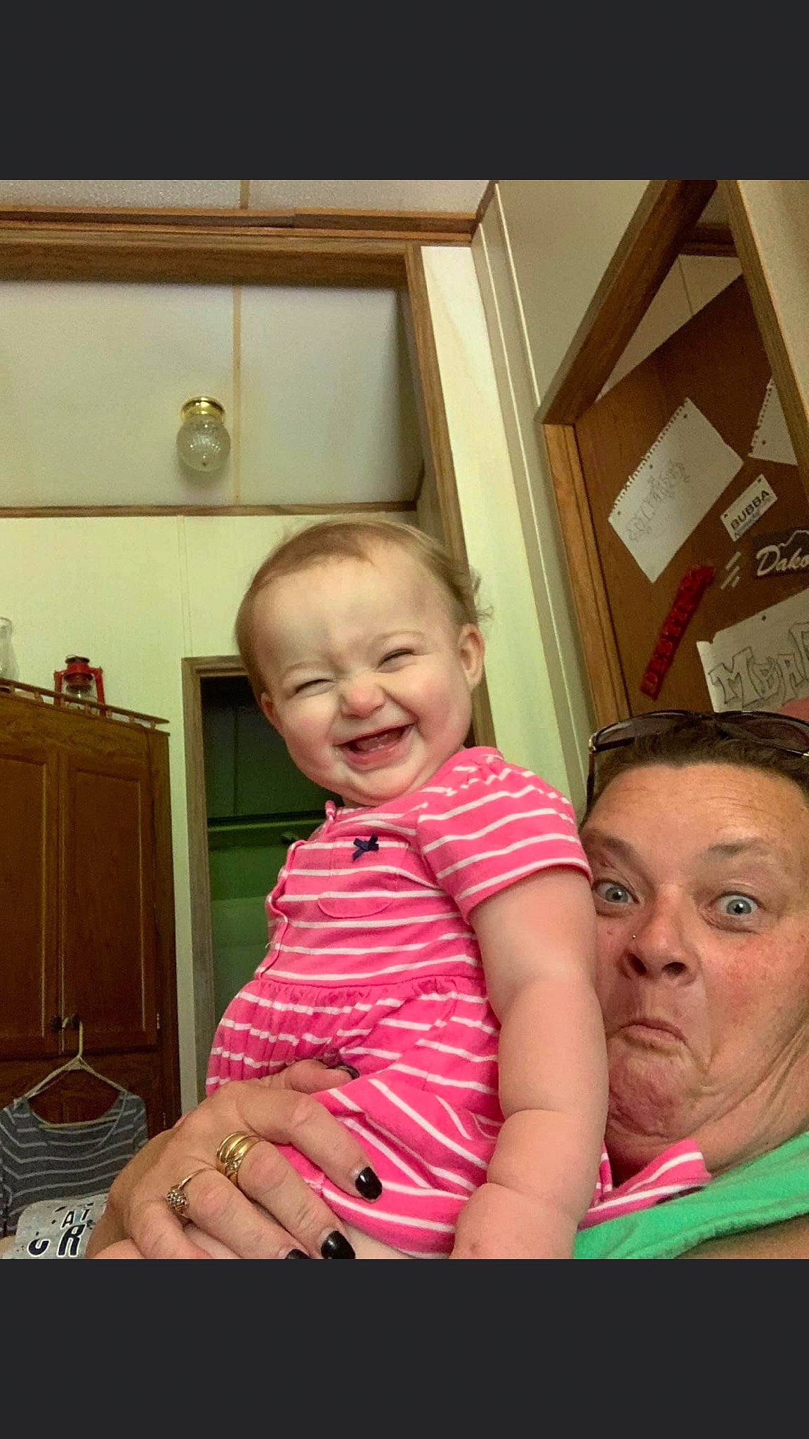 Veronica is registered to the contest to win money with this photo: baby, baby_toddler_clothing, cabinetry, cheek, child, drawer, event, face, fun, happy, head, iris, joy, kitchen_appliance, magenta, person, room, sitting, skin, smile