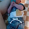 baby, blanket, blue_pants, checkered_pattern, child, clothing, comfort, cute, human, indoor, infant, legs, lying_down, pacifier, person, portrait, resting, small_hands, toddler, white_shirt