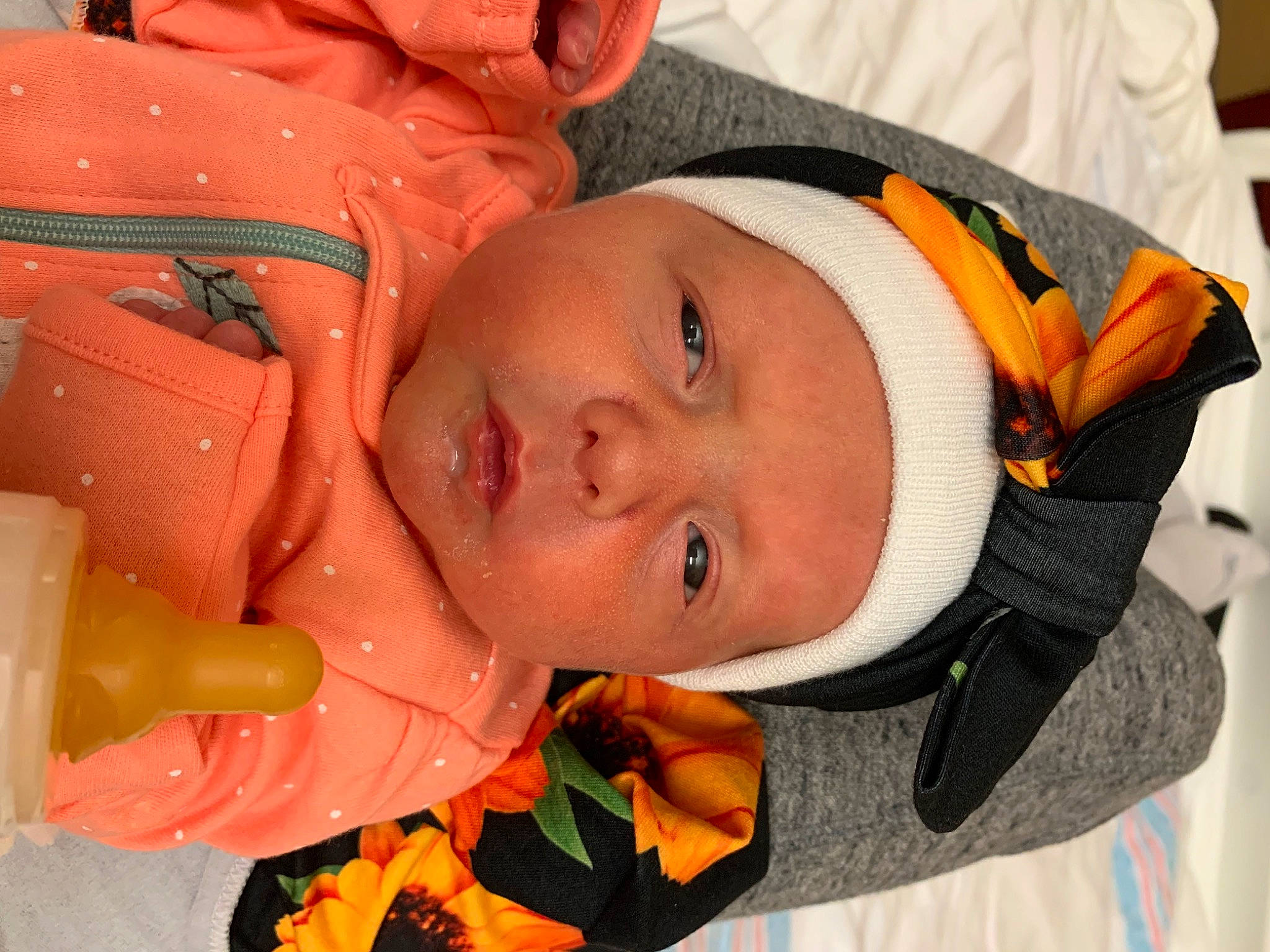 Devona joined the competition — help win amazing prizes! baby, baby_products, baby_toddler_clothing, cheek, child, comfort, eye, eyelash, fun, happy, headwear, helmet, mouth, nose, orange, person, personal_protective_equipment, skin, textile, toddler