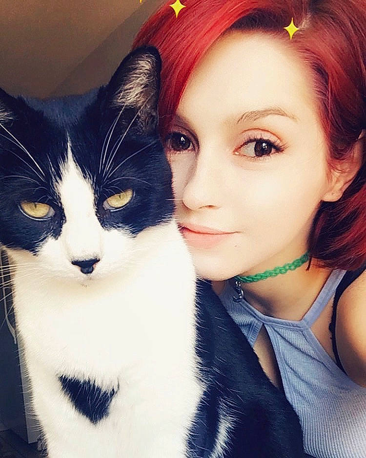 Felix is registered to the contest to win money with this photo: beauty, black_hair, cat, cheek, eye, eyebrow, face, felidae, forehead, fur, hair, hairstyle, head, iris, lip, nose, person, selfie, skin, small_to_medium_sized_cats