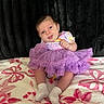 baby, tutu, dress, purple, blanket, floral, socks, infant, cute, smile, sitting, child, portrait, indoors, fabric, texture, person, young, soft, background