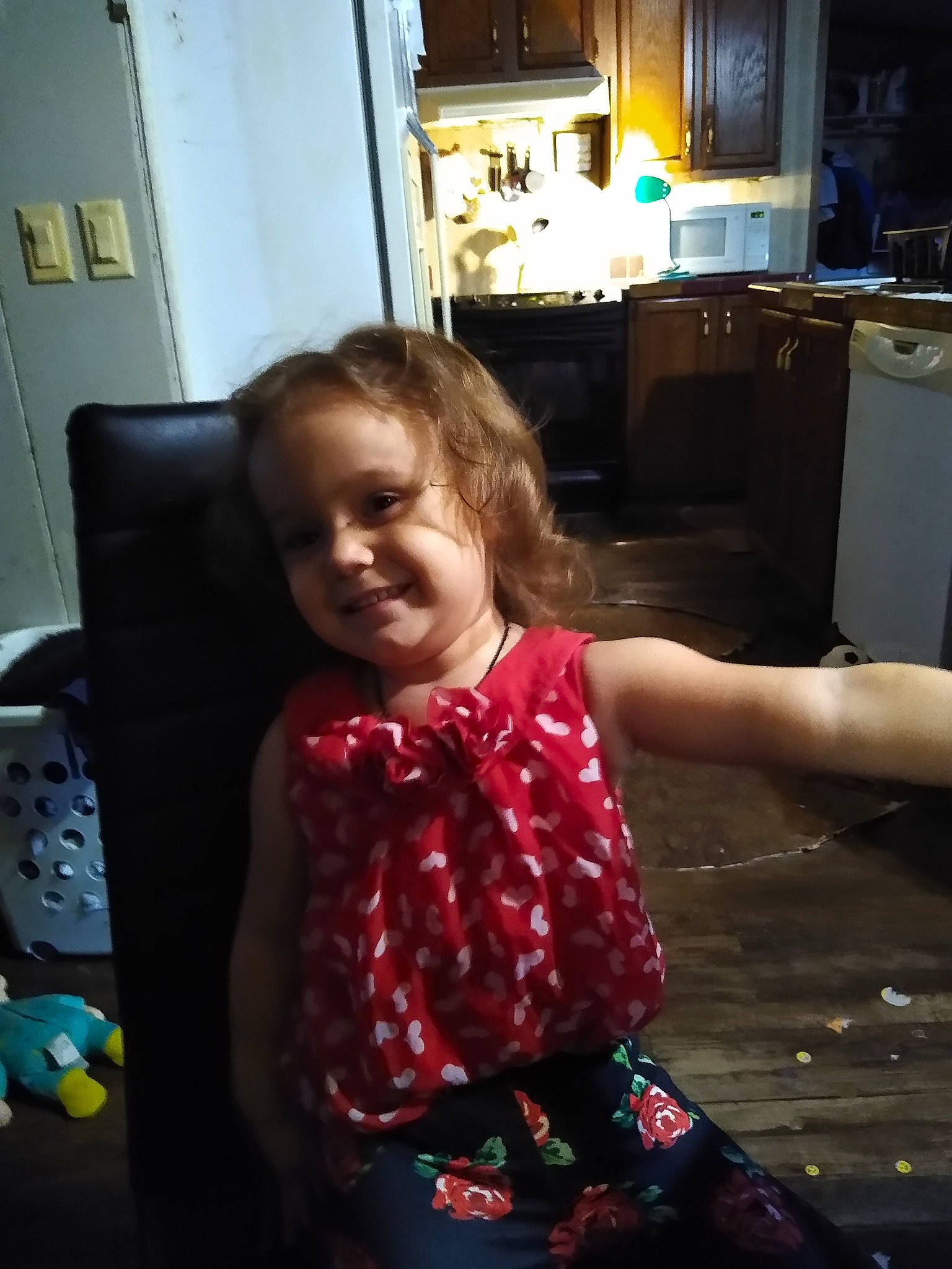 Alyssa is registered to the contest to win money with this photo: baby, baby_toddler_clothing, child, finger, flooring, fun, hairstyle, happy, joy, magenta, pattern, person, play, room, sitting, sleeve, smile, t_shirt, thumb, toddler