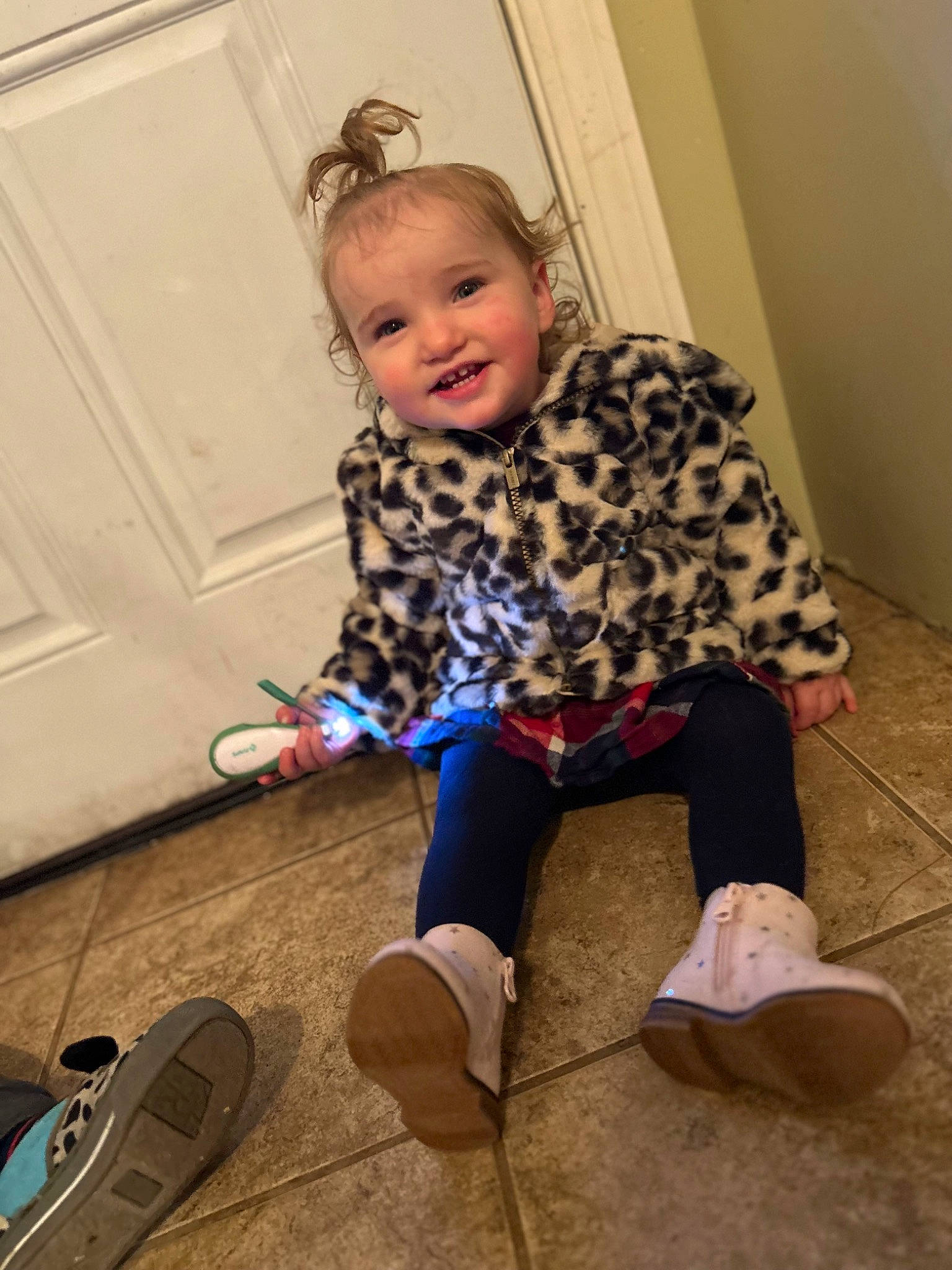 Ariel joined the competition — help win amazing prizes! baby_toddler_clothing, child, door, floor, flooring, footwear, happy, hardwood, human_body, human_leg, joint, joy, knee, leg, person, shoe, sleeve, smile, sneakers, standing