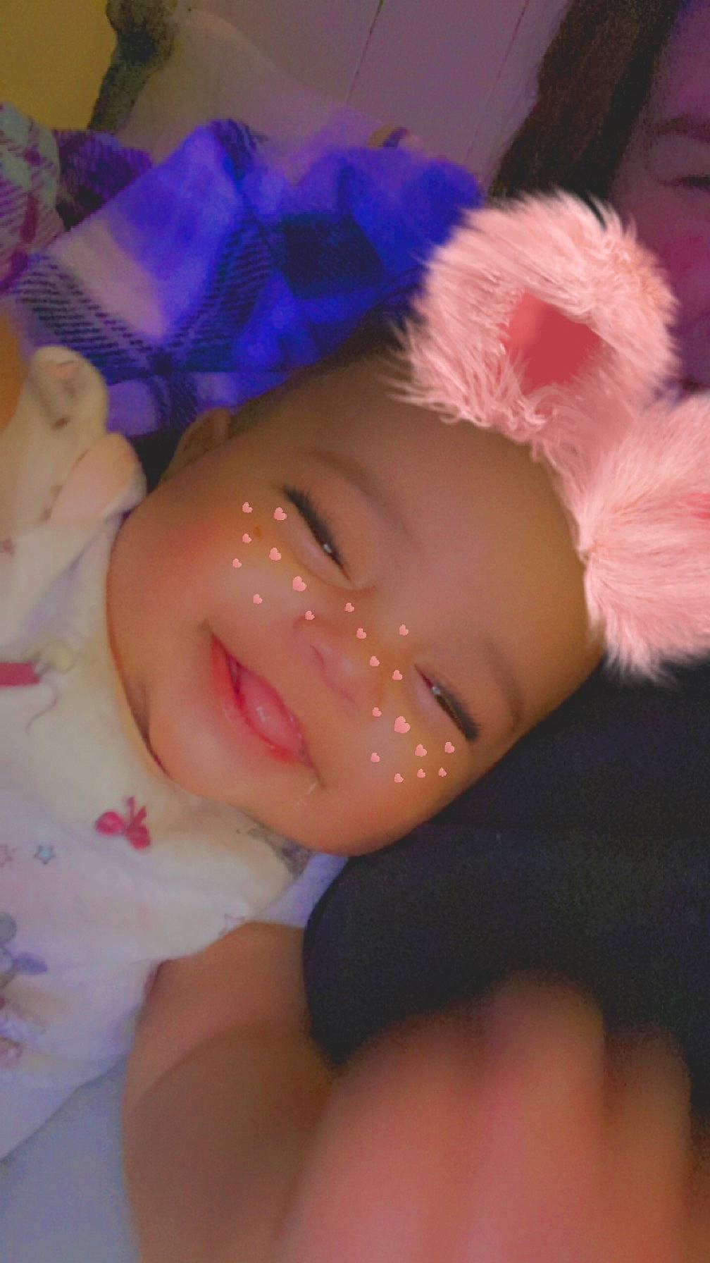 Kiara is registered to the contest to win money with this photo: baby, baby_toddler_clothing, cheek, child, eyelash, fashion_accessory, happy, headband, headwear, iris, lip, magenta, nail, nose, person, pink, skin, smile, toddler