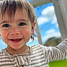 Colton is registered to the contest to win money with this photo: background_blur, child, closeup, clouds, cute, daylight, eyes, face, happy, innocence, joy, outdoor, pajamas, person, portrait, sky, smile, striped_clothing, toddler, young_child