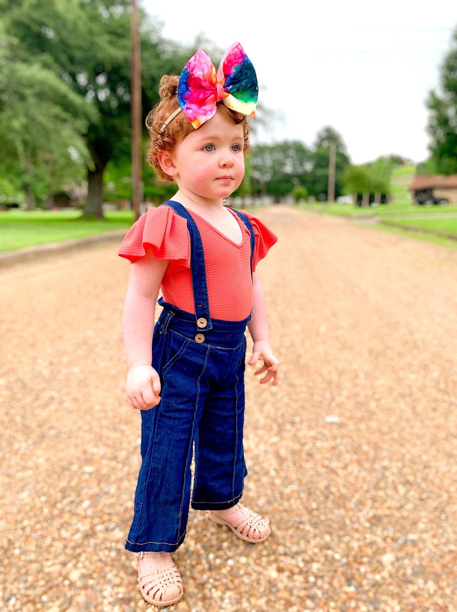 Adley is registered to the contest to win money with this photo: baby, baby_toddler_clothing, barefoot, child, clothing, dress, grass, grass_family, happy, headgear, headwear, leisure, people_in_nature, person, plant, sky, sleeve, smile, standing, summer