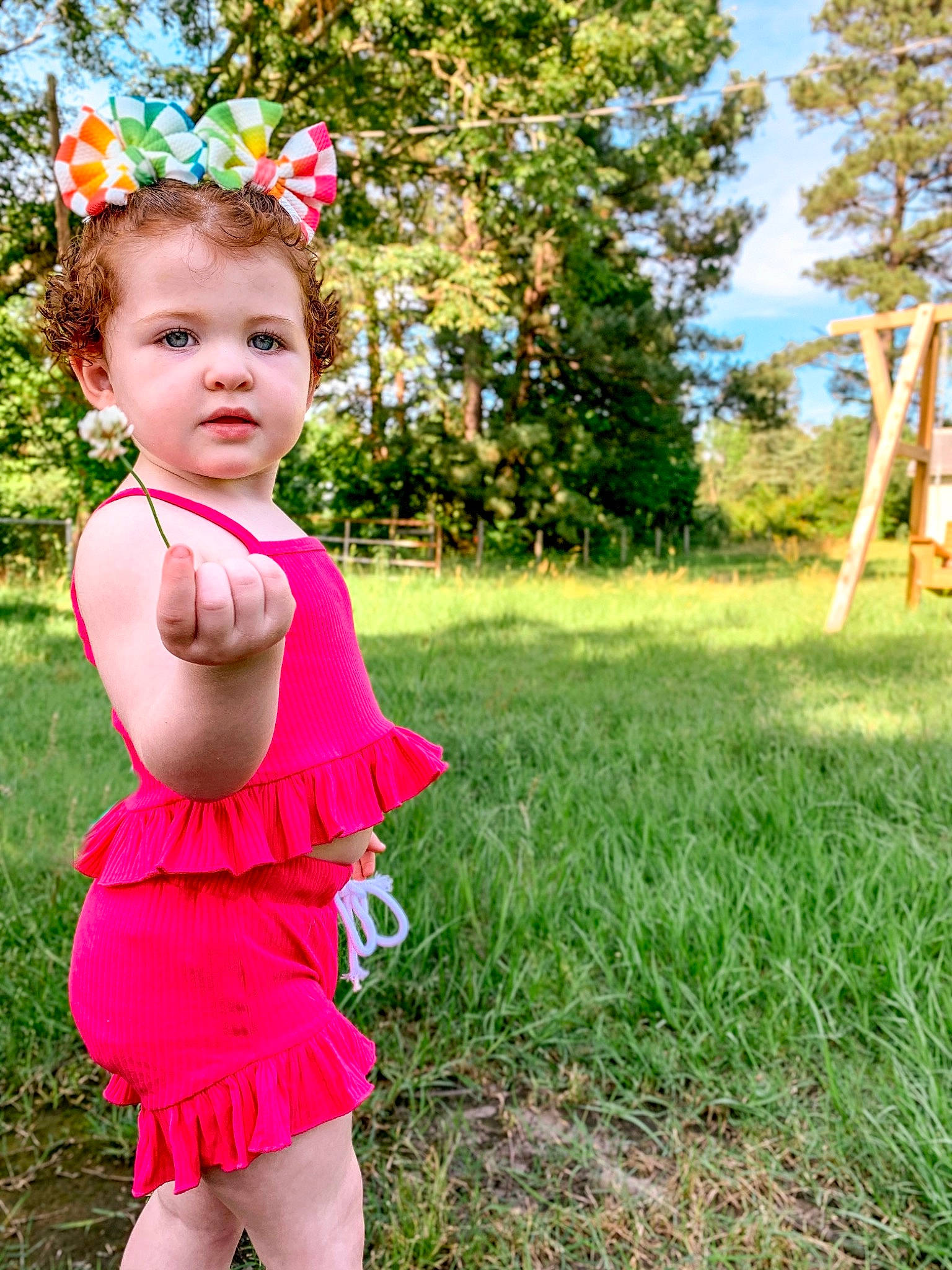 Adley joined the competition — help win amazing prizes! baby_toddler_clothing, child, day_dress, fun, grass, grass_family, grassland, green, happy, leisure, magenta, meadow, party_supply, people_in_nature, person, petal, pink, plant, sky, toddler