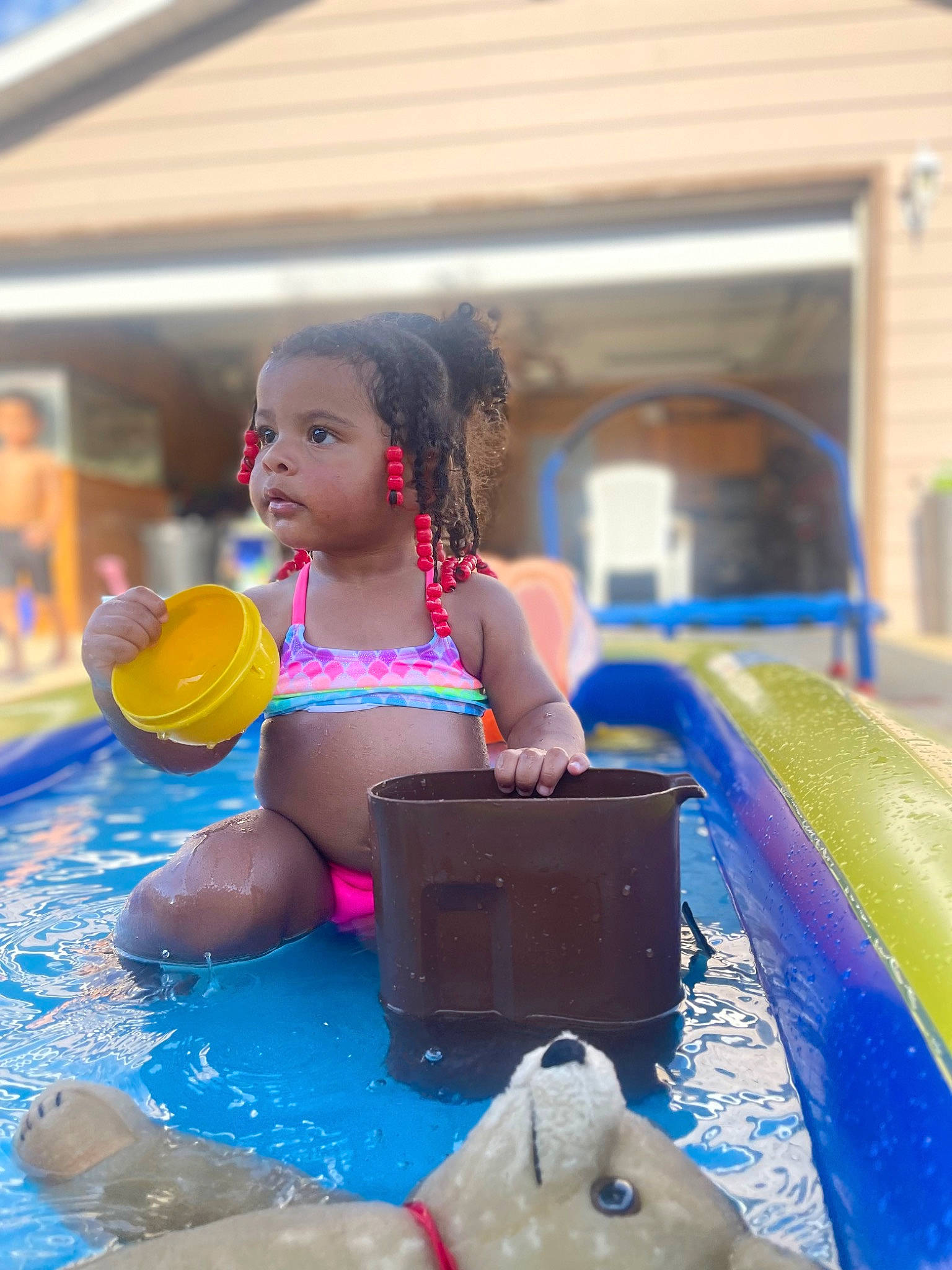 Zylah joined the competition — help win amazing prizes! bathing, blue, child, chute, city, fun, happy, leisure, nonbuilding_structure, outdoor_play_equipment, person, personal_protective_equipment, play, playground, recreation, sitting, snapshot, swimming_pool, swimwear, toddler