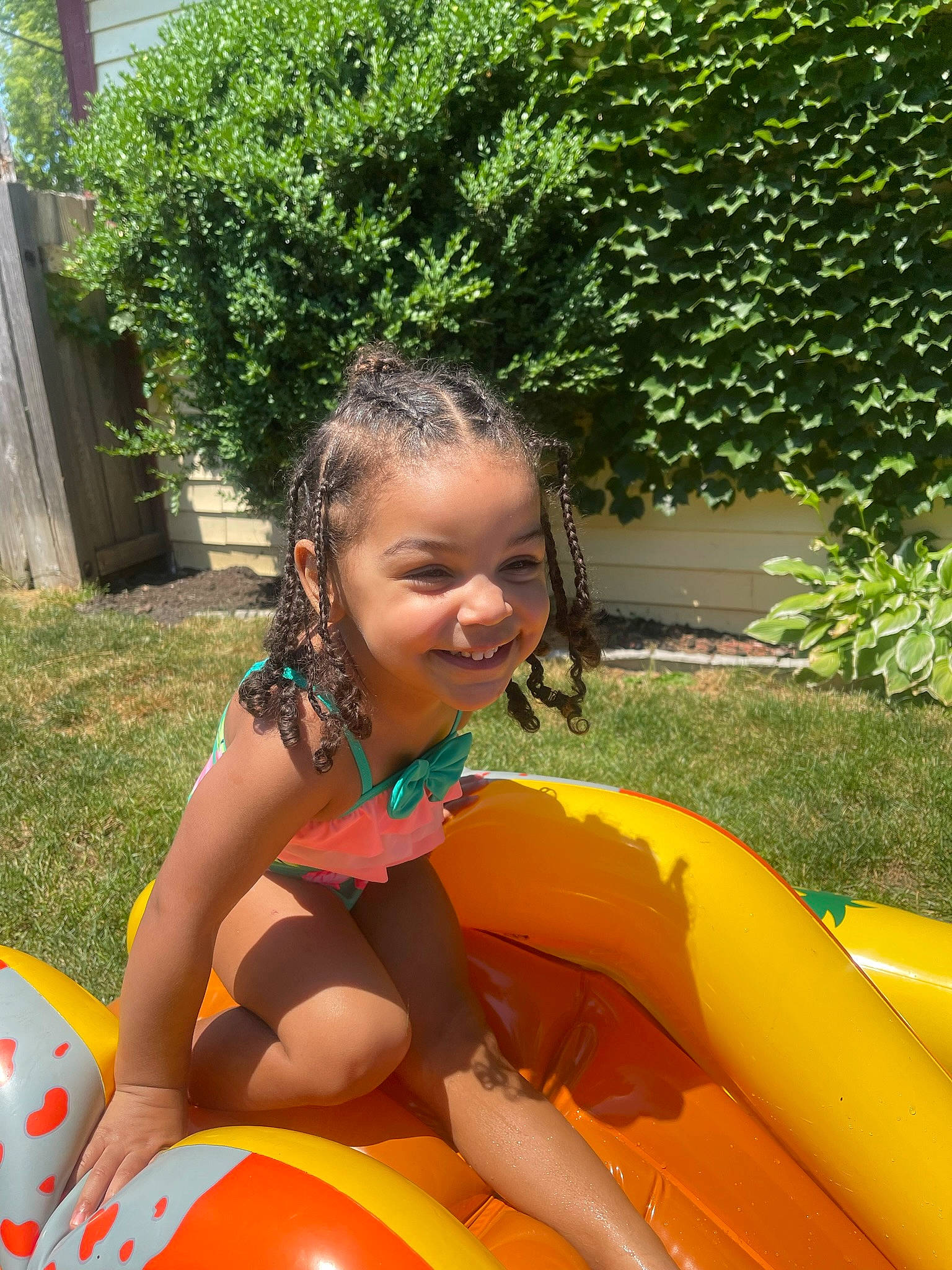 Azrielle joined the competition — help win amazing prizes! ball, child, event, fun, grass, hair, happy, head, human_body, joy, leisure, outdoor_play_equipment, people_in_nature, person, plant, recreation, smile, summer, swimwear, thigh