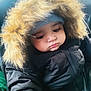 Syed Masoom joined the competition — help win amazing prizes! toddler, child, winter_clothing, hood, fur, jacket, coat, baby, face, seat, car_seat, warm, cute, indoors, person, portrait, young_child, clothing, headwear, expression