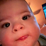 Jasper joined the competition — help win amazing prizes! baby, close_up, face, tongue, cheeks, eyes, child, infant, skin, expression, portrait, cute, indoor, person, young_child, head, warm_light, curious, rosy_cheeks, mouth