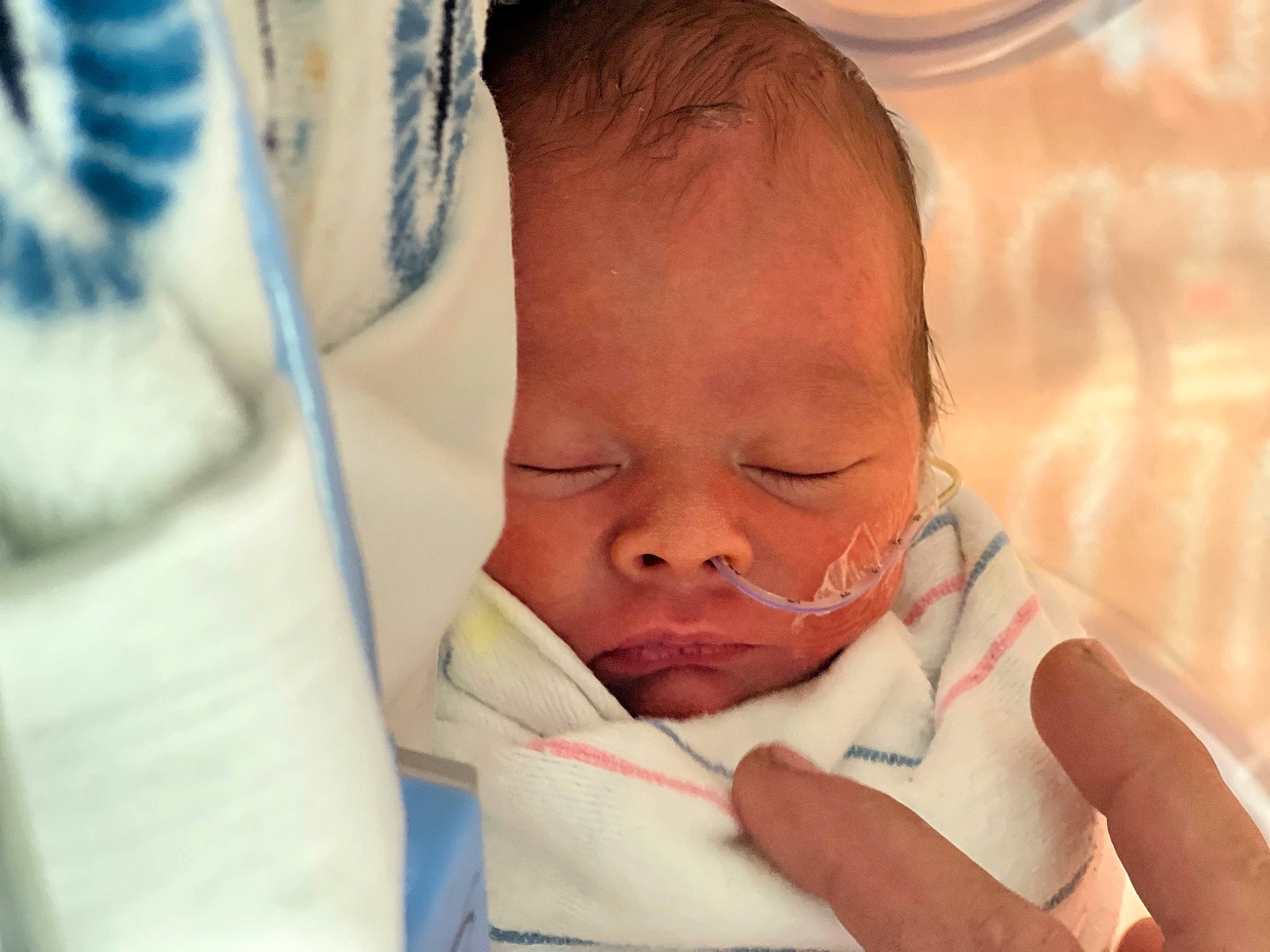 Cristovio is registered to the contest to win money with this photo: baby, cheek, chin, comfort, dress, ear, eyebrow, eyelash, face, facial_expression, finger, gesture, happy, iris, lip, mouth, nose, person, skin, thumb