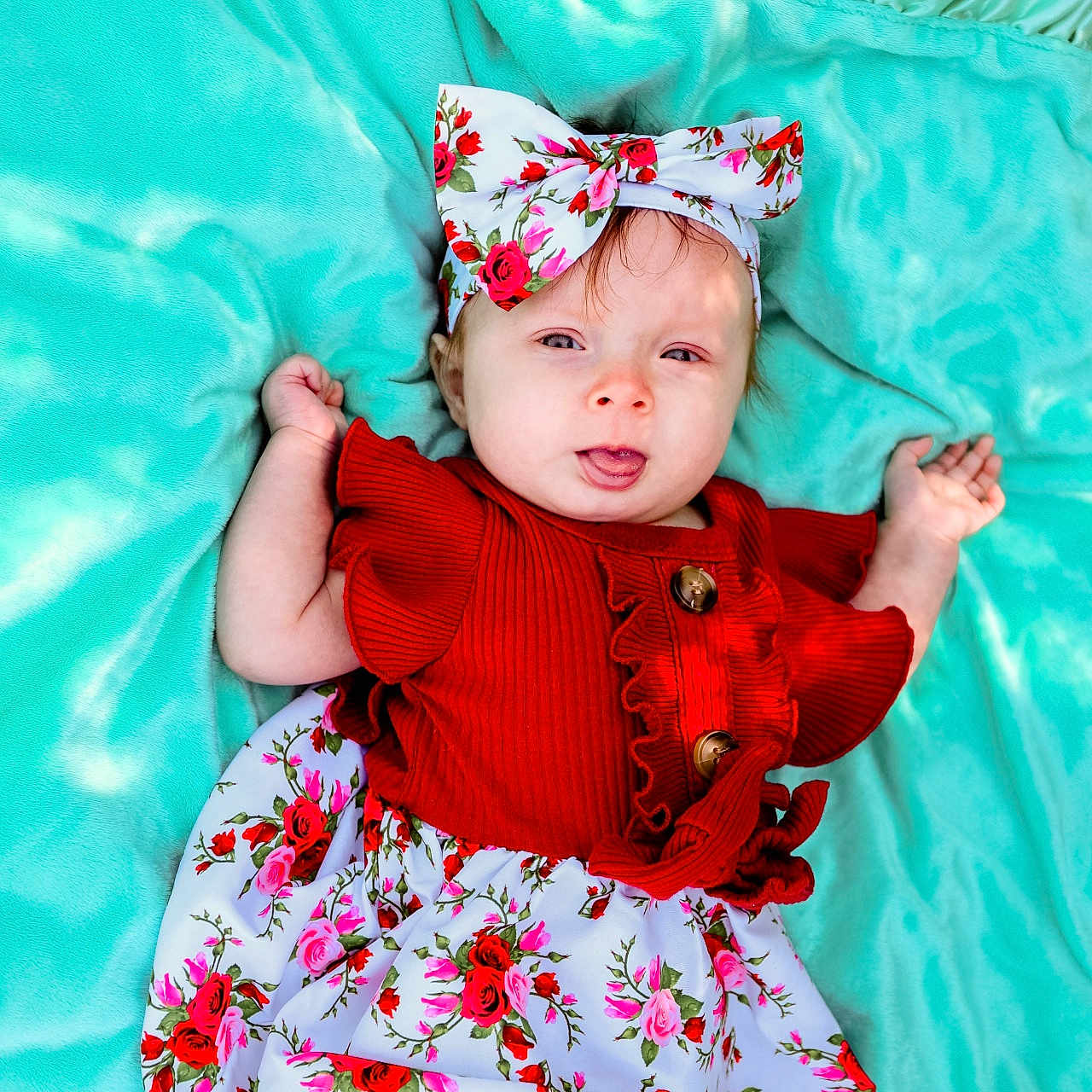 Paisleigh joined the competition — help win amazing prizes! baby, bed, blanket, bodypart, bonnet, clothing, costume, cushion, dress, face, finger, furniture, hand, hat, head, pattern, person, photography, portrait, skirt
