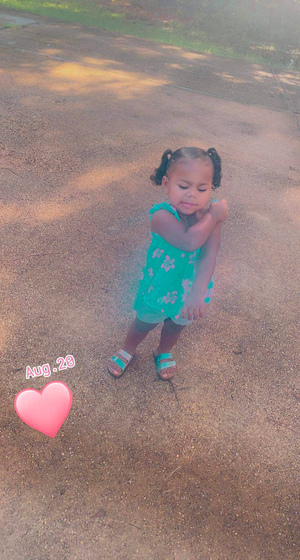 Katherine is registered to the contest to win money with this photo: asphalt, balloon, cloud, fun, grass, happy, human_body, landscape, leisure, magenta, organ, people_in_nature, person, pink, recreation, red, sand, sky, soil, tints_and_shades