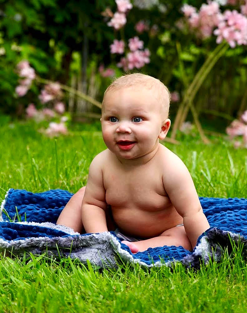 Kylo joined the competition — help win amazing prizes! baby, baby_toddler_clothing, eye, flash_photography, flower, grass, grass_family, happy, head, human_body, joy, lawn, leg, leisure, meadow, people_in_nature, person, plant, skin, smile