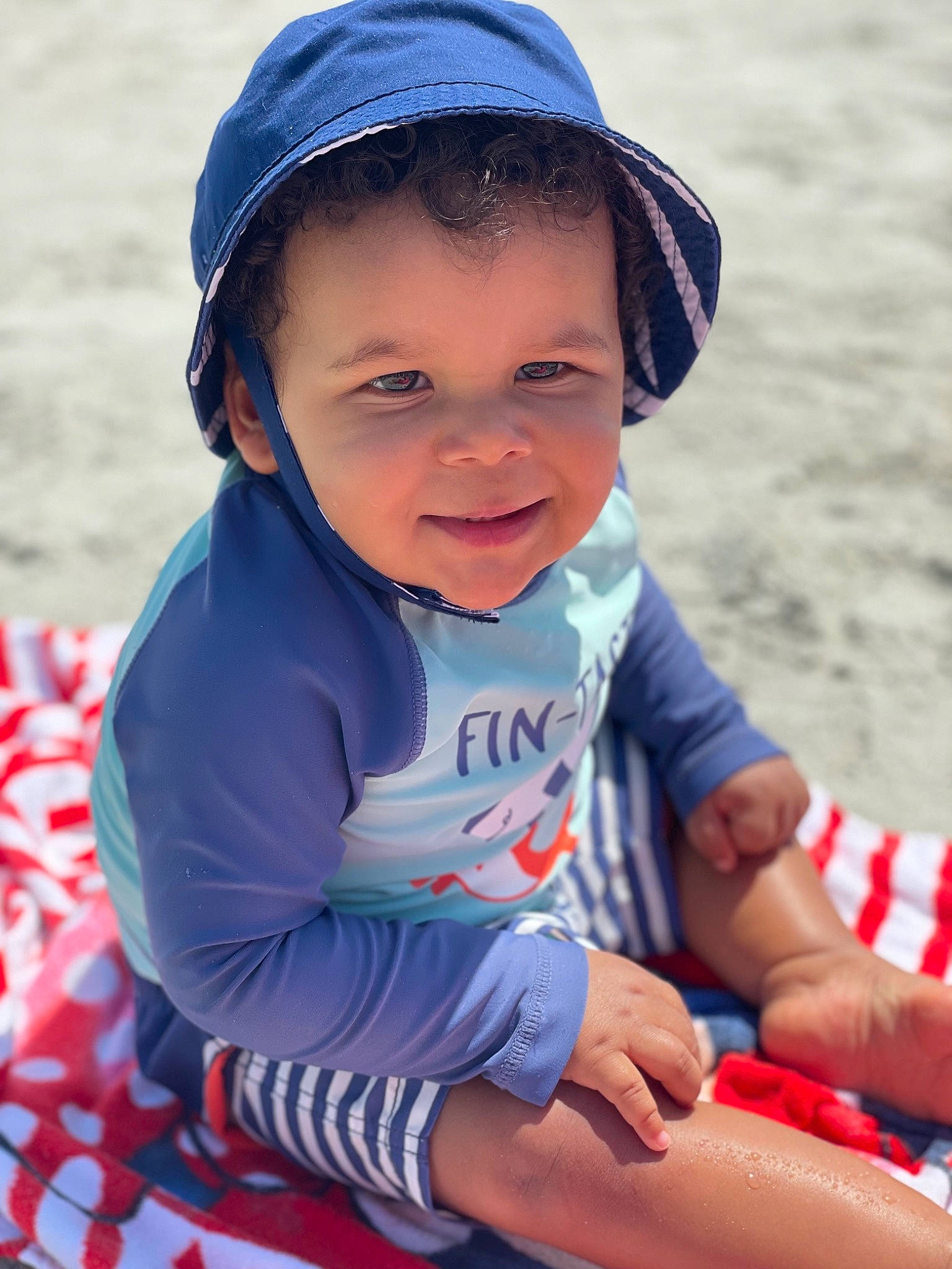 Martin joined the competition — help win amazing prizes! baby_toddler_clothing, baseball_cap, blue, body_of_water, cap, eye, finger, hand, happy, hat, head, headwear, human_body, lip, people_in_nature, person, photograph, skin, smile, toddler
