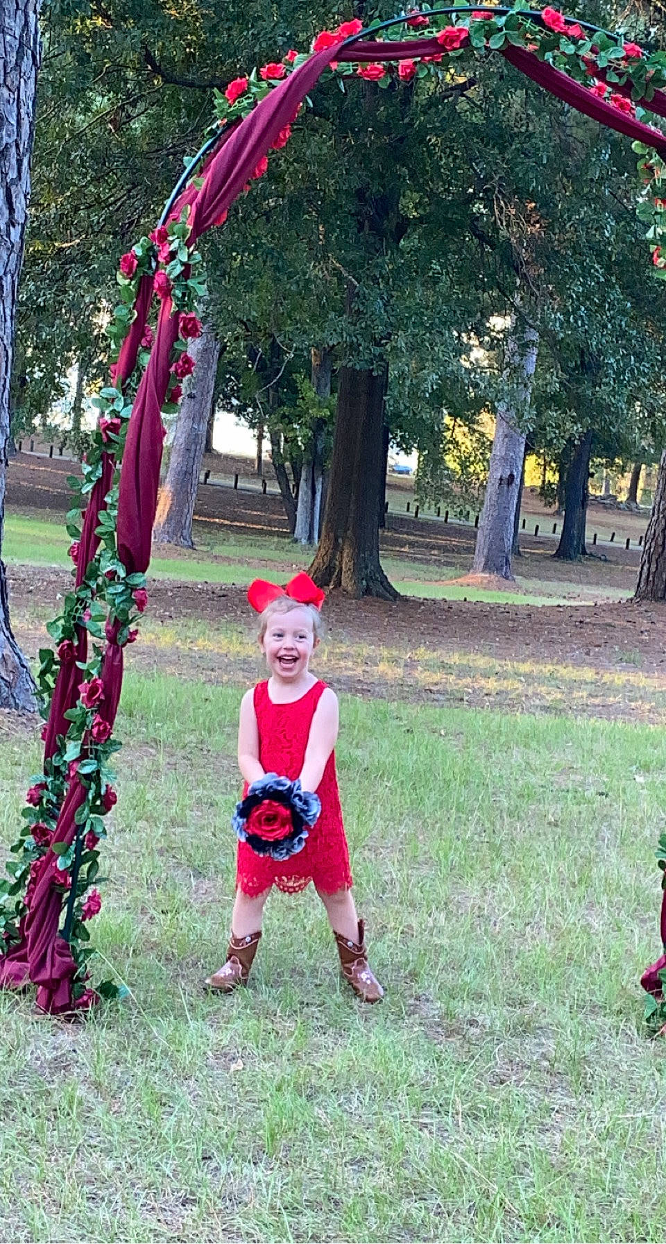 Layla is registered to the contest to win money with this photo: fun, garden, gesture, grass, joy, lawn, lawn_ornament, leisure, magenta, party_supply, people_in_nature, person, pink, plant, play, pole, public_space, recreation, red, terrestrial_plant