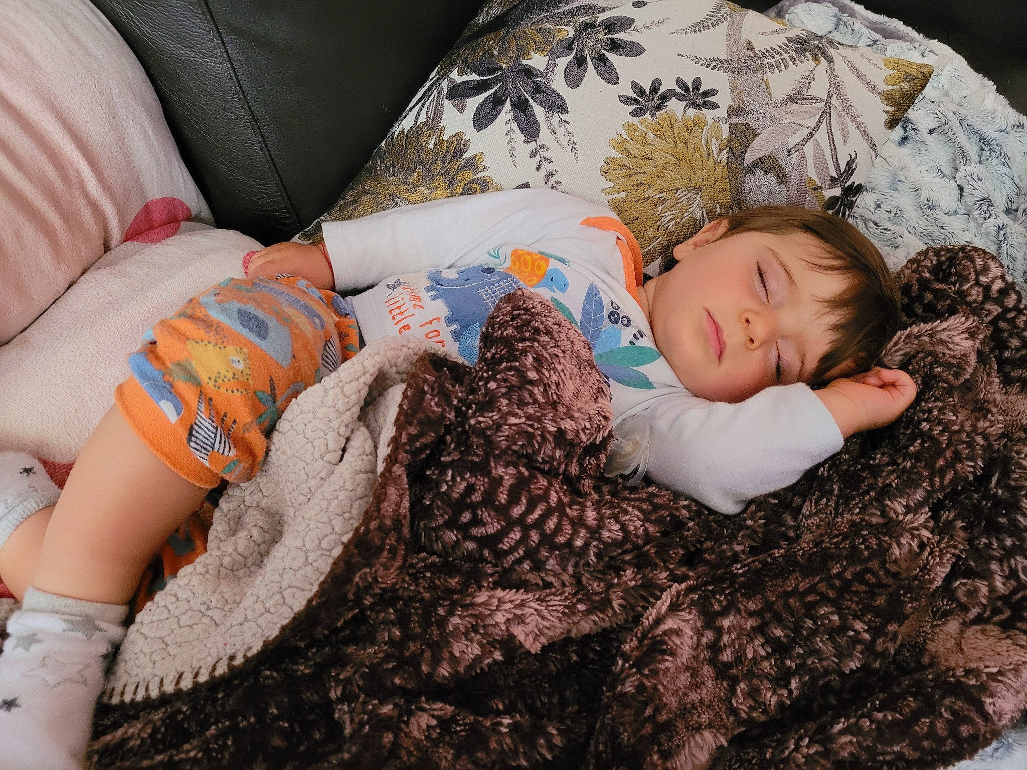 Martyn joined the competition — help win amazing prizes! baby, baby_sleeping, bedding, bedtime, child, comfort, couch, flooring, grass, hairstyle, human_leg, linens, pattern, person, sitting, skin, t_shirt, textile, thigh, toddler