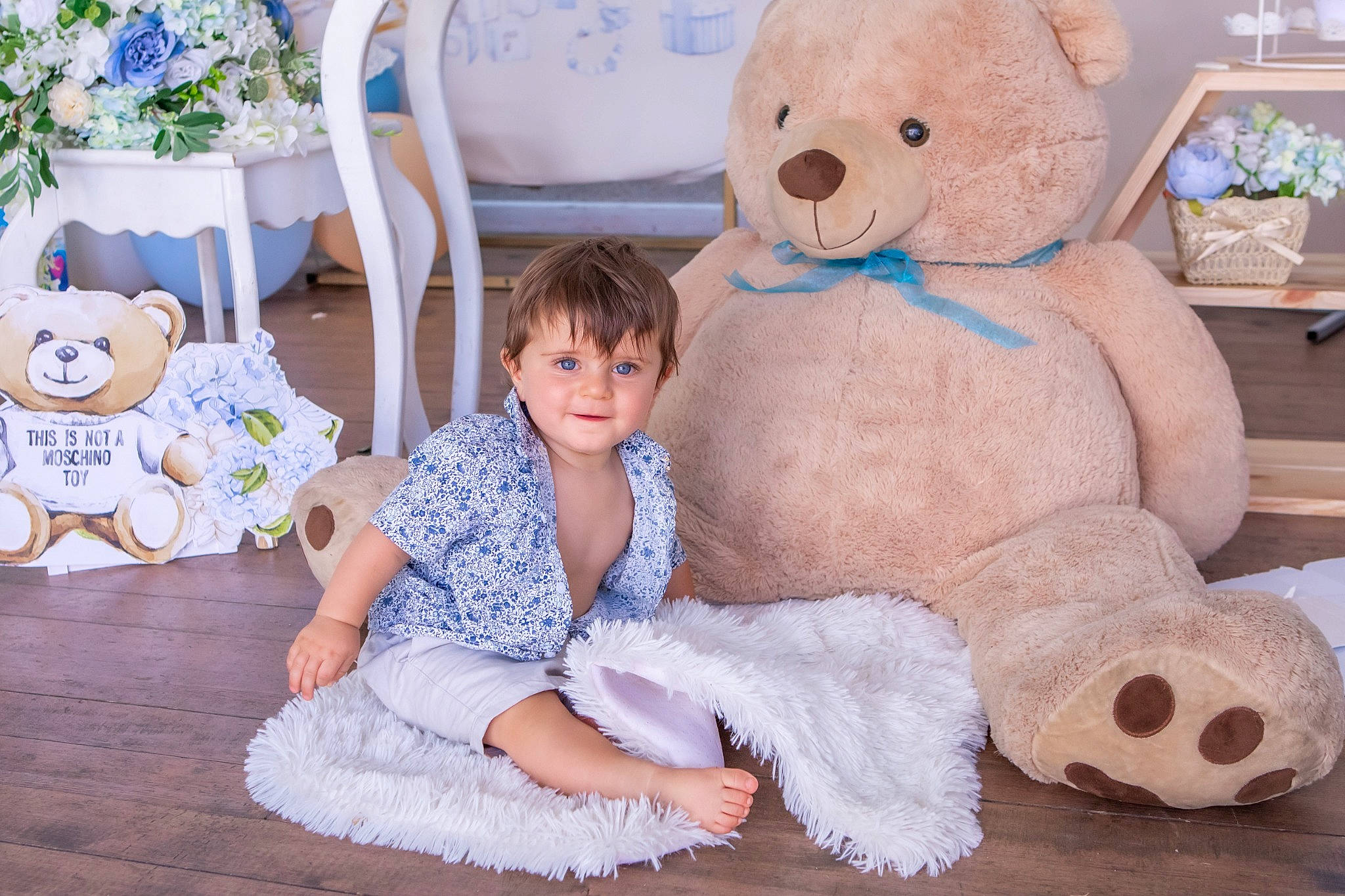 Martyn is registered to the contest to win money with this photo: baby_toddler_clothing, chair, child, comfort, flooring, fun, happy, head, houseplant, mammal, person, photograph, pink, snapshot, stuffed_toy, teddy_bear, textile, toddler, toy, vertebrate