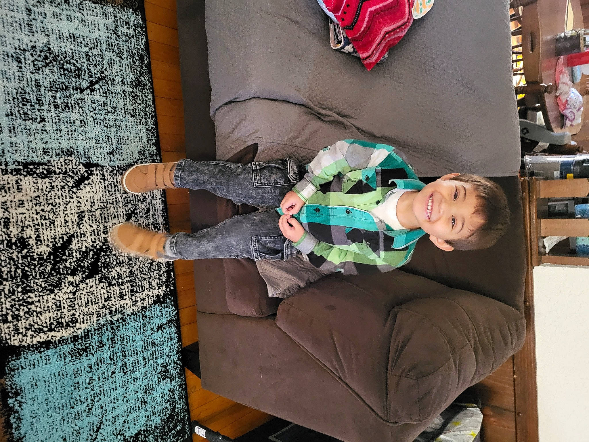 Cillian joined the competition — help win amazing prizes! asphalt, baby_products, child, comfort, flag, flooring, fun, human_leg, joy, lap, leg, leisure, pattern, person, road_surface, room, sidewalk, sitting, sock, thigh