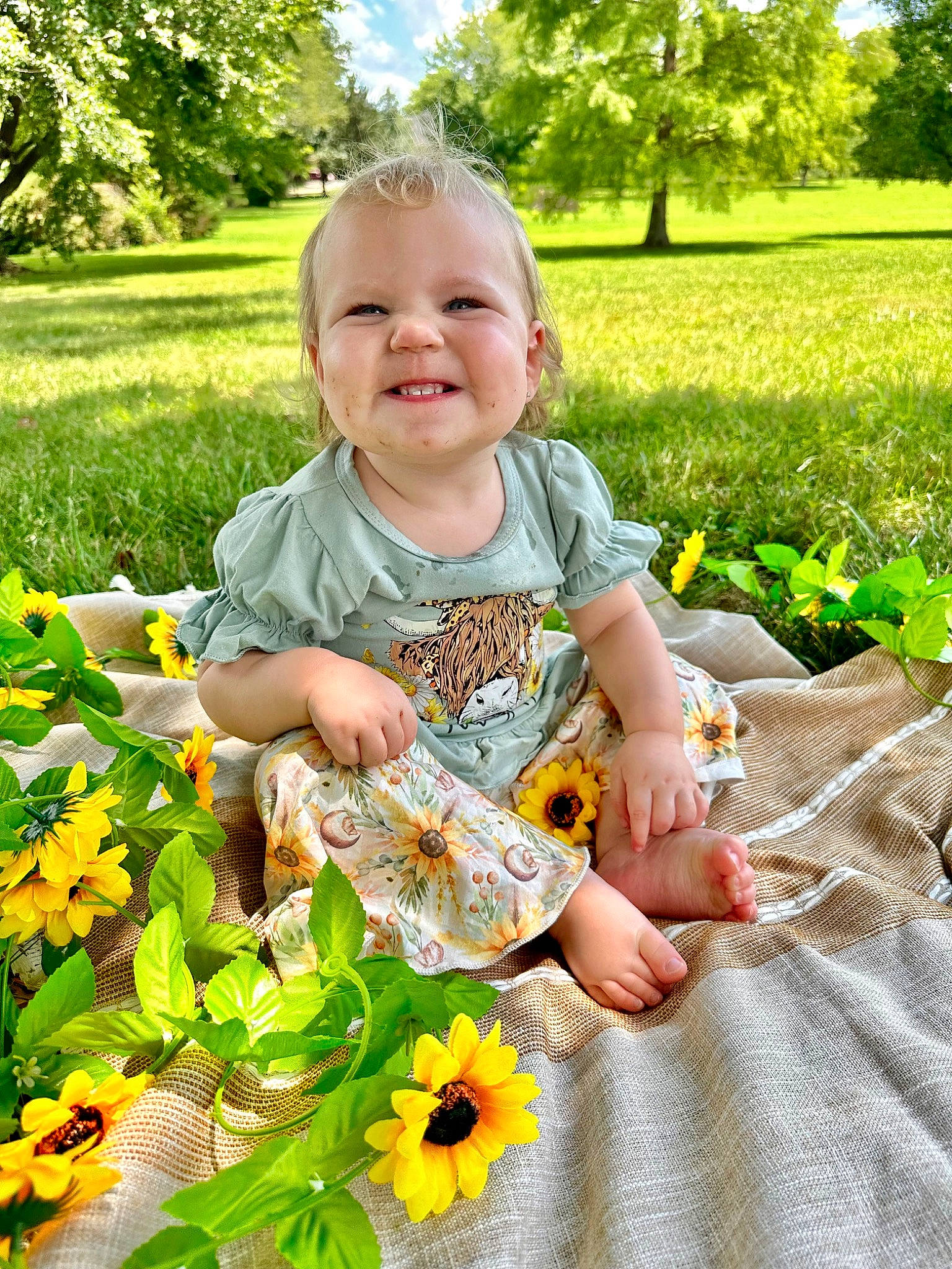 Aries joined the competition — help win amazing prizes! annual_plant, baby, baby_toddler_clothing, botany, child, flower, flowering_plant, grass, green, groundcover, happy, joy, leaf, nature, people_in_nature, person, petal, plant, smile, summer
