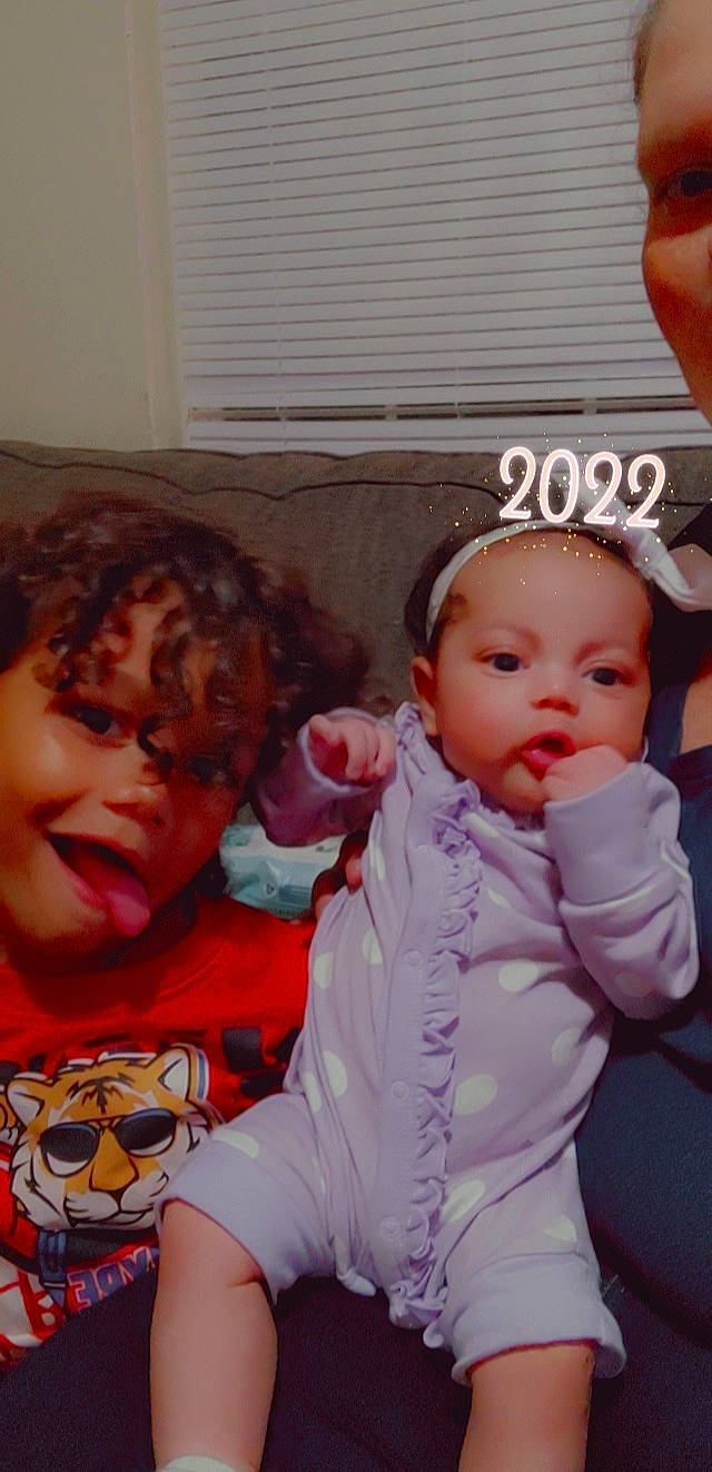 Jordan is registered to the contest to win money with this photo: baby, baby_toddler_clothing, cheek, child, chin, eye, eyebrow, eyelash, face, finger, happy, head, interaction, iris, lip, mouth, nose, person, sharing, skin