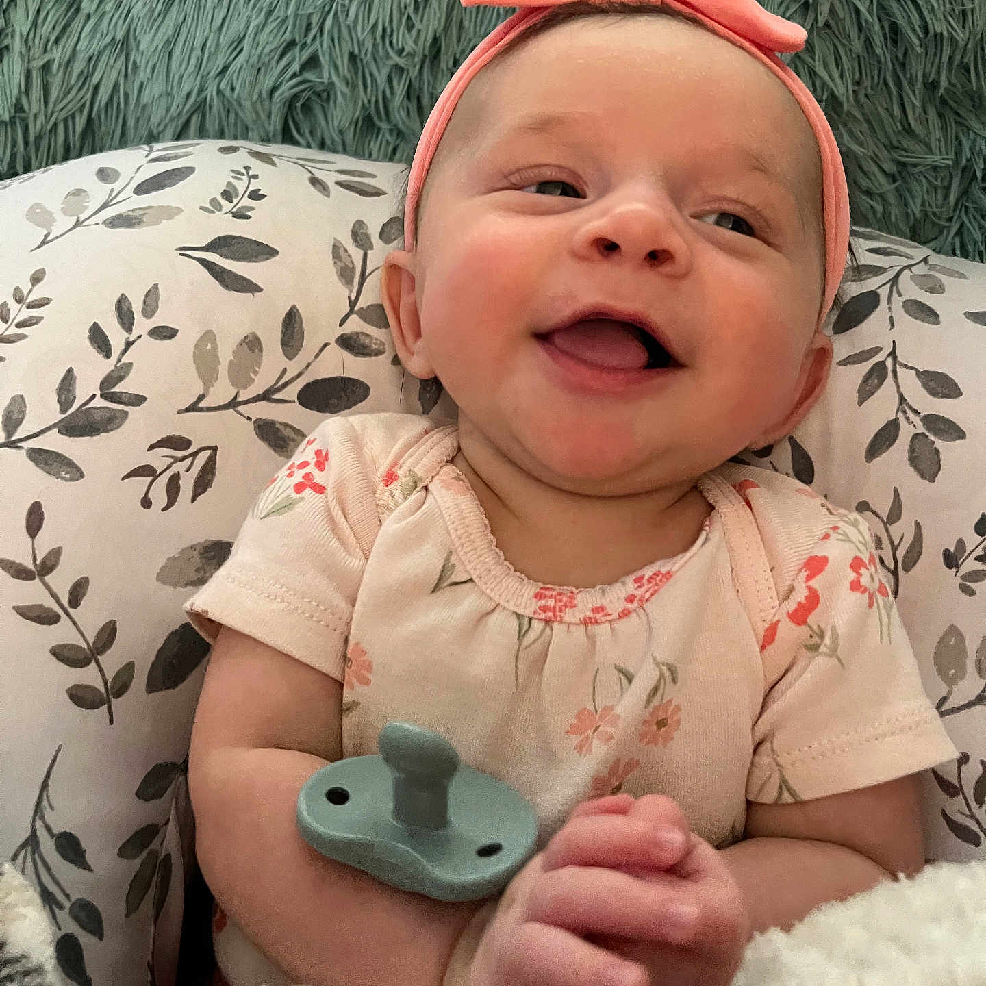 Annison is registered to the contest to win money with this photo: baby, babylaughing, bodypart, clothing, couch, cushion, face, finger, furniture, hand, happy, hat, head, homedecor, laughing, newborn, person, photography, portrait, smile