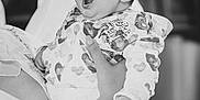 Solomia a rejoint le concours — aidez-le/la à gagner de superbes lots ! baby, child, infant, holding, person, adult, arm, hand, face, expression, yawn, surprise, black_and_white, clothing, pattern, heart, portrait, indoor, blurred_background, closeup