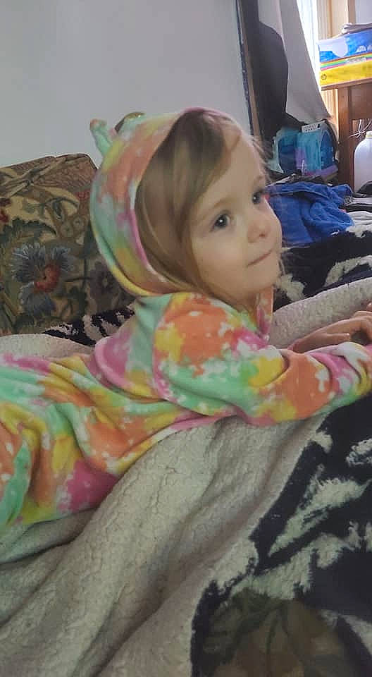 Ivory is registered to the contest to win money with this photo: baby, baby_toddler_clothing, cheek, child, comfort, dress, face, facial_expression, fun, head, leisure, person, play, room, sitting, toddler, visual_arts