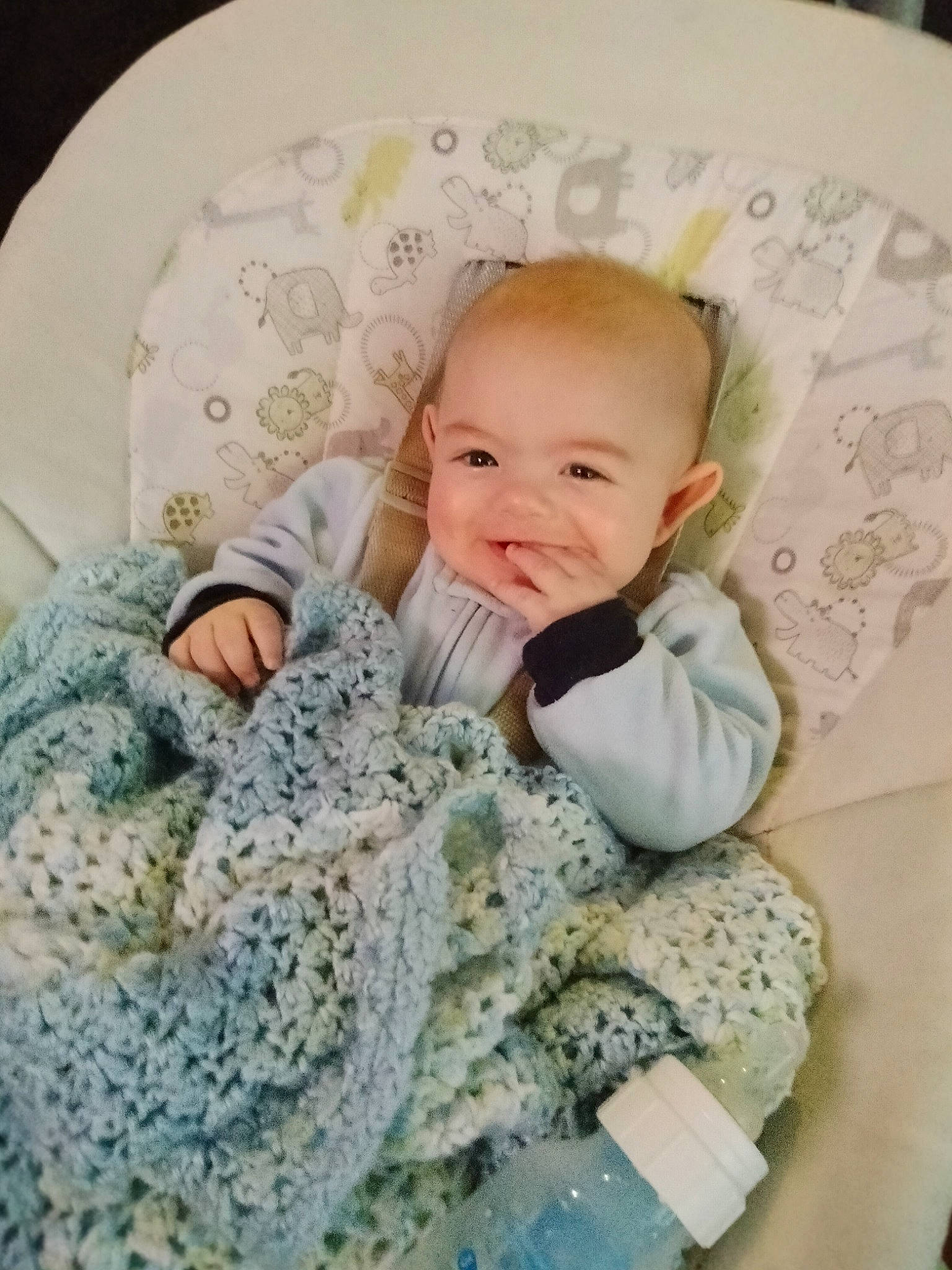 Myles is registered to the contest to win money with this photo: baby, baby_products, baby_sleeping, baby_toddler_clothing, bedding, child, collar, comfort, fur, joy, linens, pattern, person, product, room, sitting, skin, sleeve, smile, textile